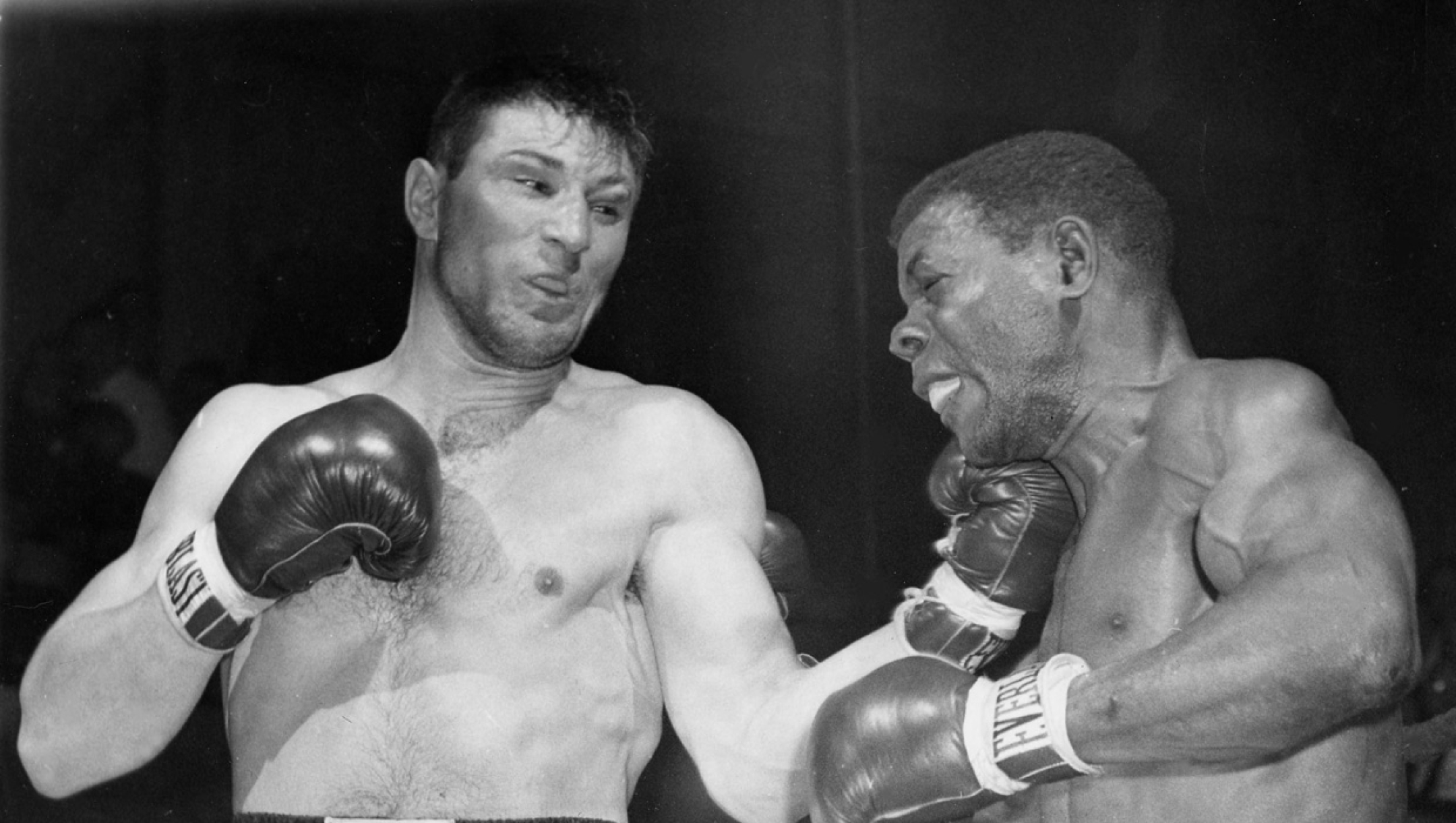 FILE -- Canadian light heavyweight champion Yvon Durelle digs a left uppercut to the chin of Clarence Floyd in third round of scheduled 10-rounds main bout in New York March 25, 1957. Durelle was in hospital Wednesday in serious condition after suffering a stroke. Durelle, 77, of Baie-Ste-Anne, N.B., has died after suffering a stroke on Christmas day. (CP PICTURE ARCHIVE)