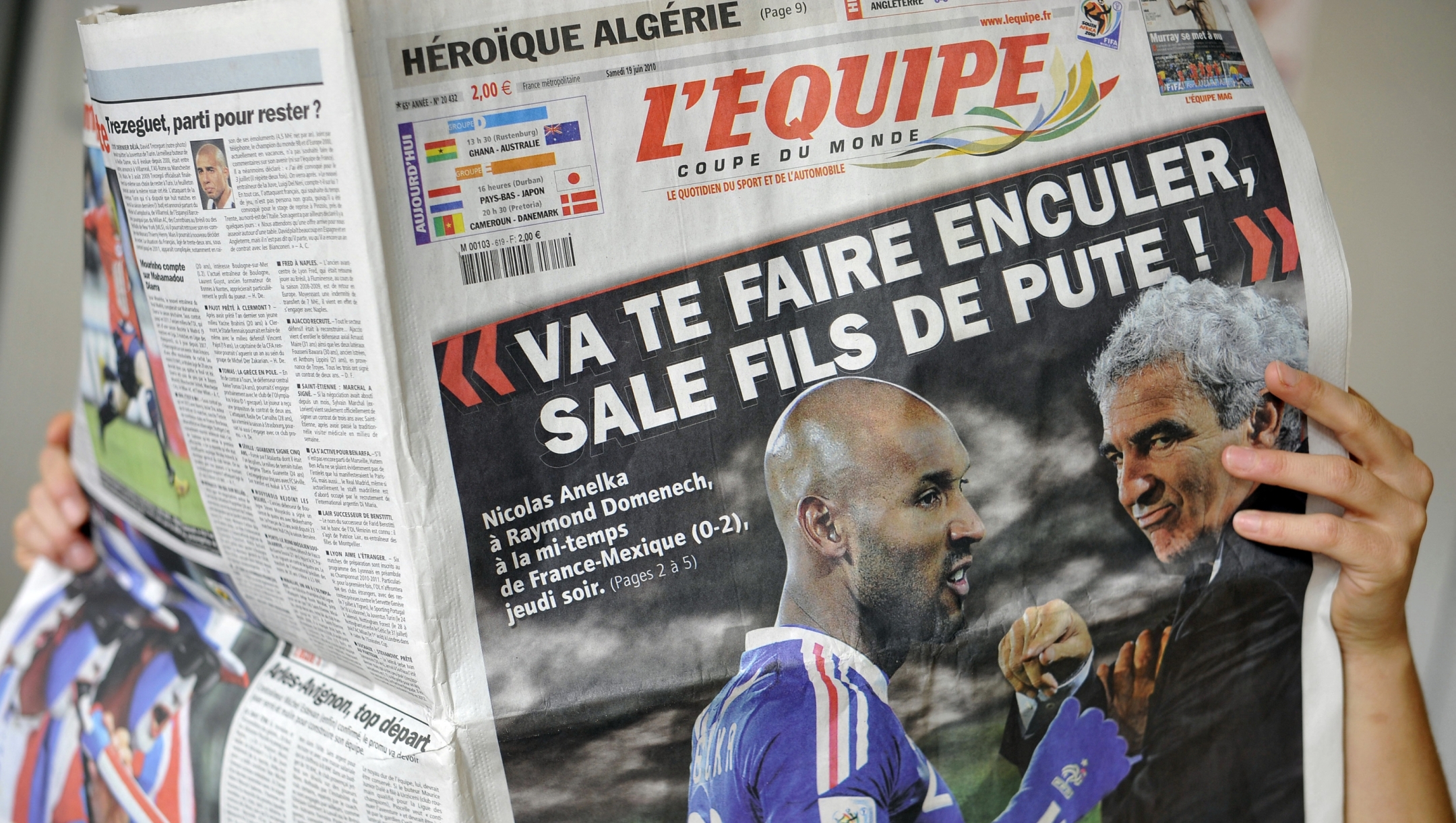 A person reads French sport newspaper L'Equipe on June 19, 2010 in Strasbourg. France striker Nicolas Anelka was kicked out of the World Cup on Saturday after reportedly launching a tirade of abuse at coach Raymond Domenech, according the French Football Federation (FFF). The 31-year-old Chelsea forward is reported to have told Domenech to "go screw yourself, dirty son of a whore" in the dressing room after the coach took issue with his first-half performance against Mexico, sports daily L'Equipe claimed. AFP PHOTO / JOHANNA LEGUERRE (Photo by JOHANNA LEGUERRE / AFP)