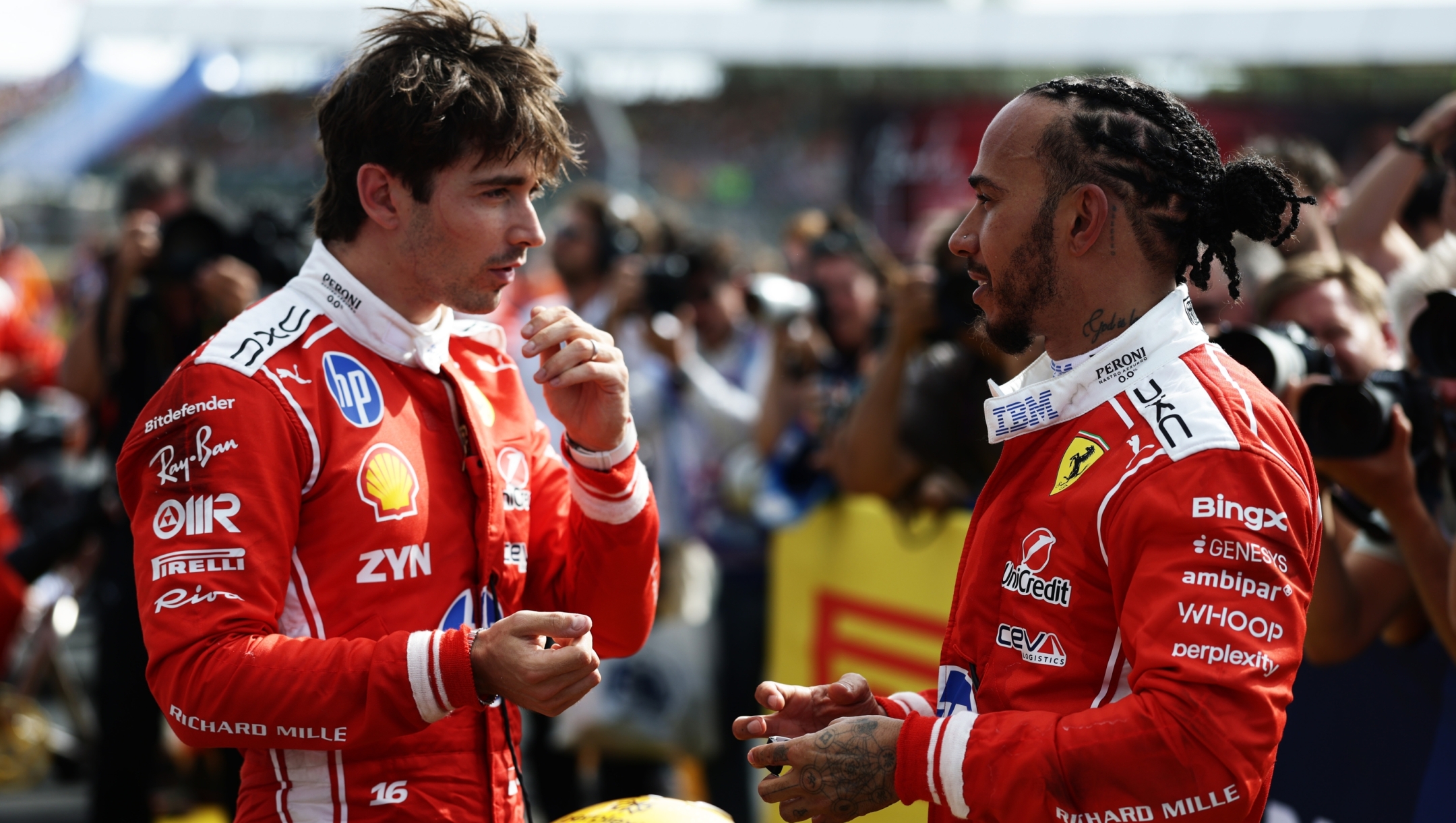  Race winner Charles Leclerc of Monaco and Scuderia Ferrari and Third placed Lewis Hamilton of Great Britain and Scuderia Ferrari talk in parc ferme during the F1 Grand Prix of Great Britain at Silverstone Circuit on July 05, 2026 in Northampton, England. (Photo by Mark Thompson/Getty Images)