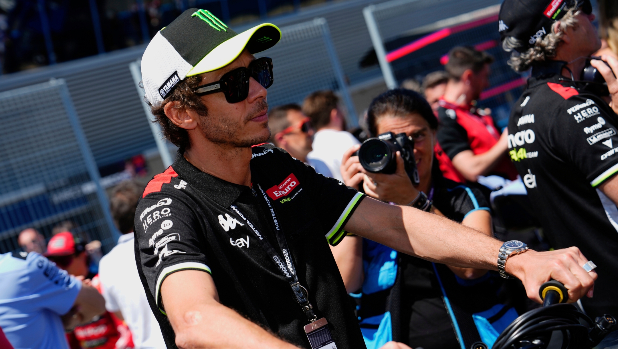 FILE - Former rider, nine times World Champion in Moto GP Valentino Rossi waits for the start of the MotoGP race of the Grand Prix of Spain, at the Angel Nieto racetrack in Jerez de la Frontera, Spain, April 27, 2025. (AP Photo/Jose Breton, File)