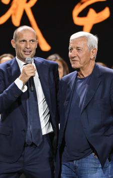 TURIN, ITALY - OCTOBER 10: Massimiliano Allegri and Marcello Lippi during the 'Together, A Black and White Show' event at Pala Alpitour on October 10, 2023 in Turin, Italy. (Photo by Chris Ricco - Juventus FC/Juventus FC via Getty Images)