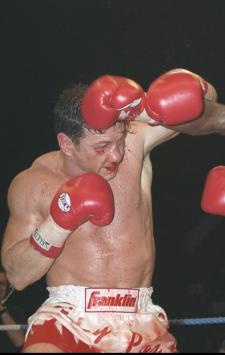 6 Dec 1997:  Herol Graham (right) of Great Britain lands a blow to the head of opponent Vinny Pazienza of the USA during their Super Middleweight Championship bout at Wembley Arena in London. Graham won the bout to become the holder of the WBC Belt. \ Mandatory Credit: Mark  Thompson/Allsport