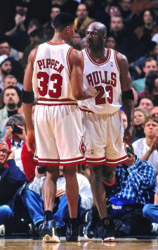 CHARLOTTE, NC - MAY 8: Michael Jordan #23 and Scottie Pippen #33 of the Chicago Bulls huddle together against the Charlotte Hornets on May 8, 1998 at Charlotte Coliseum in Charlotte, North Carolina. NOTE TO USER: User expressly acknowledges and agrees that, by downloading and or using this photograph, User is consenting to the terms and conditions of the Getty Images License Agreement. Mandatory Copyright Notice: Copyright 1998 NBAE   Kent Smith/NBAE via Getty Images/AFP (Photo by Kent Smith / NBAE / Getty Images / Getty Images via AFP)
