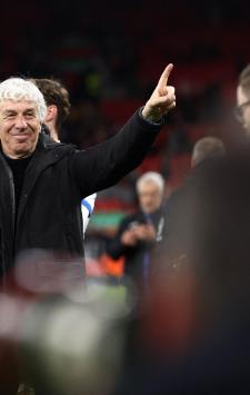 Atalanta's Italian coach Gian Piero Gasperini applauds the fans following the UEFA Europa League quarter-final first leg football match between Liverpool and Atalanta at Anfield in Liverpool, north west England on April 11, 2024. Atalanta won the match 3-0. (Photo by Darren Staples / AFP)