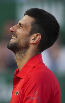 Serbia's Novak Djokovic reacts while playing against Casper Ruud, of Norway, during a semifinals match at the Monte Carlo Tennis Masters tournament in Monaco, Saturday, April 13, 2024. (AP Photo/Daniel Cole)