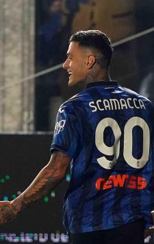 Atalanta?s Gianluca Scamacca  celebrates after scoring 2-1  during the  Coppa Italia  soccer  match between Atalanta and Fiorentina  at  Gewiss stadium  , north Italy - wednesday 24 , April , 2024. Sport - Soccer . (Photo by Spada/LaPresse)