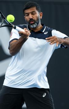 ADELAIDE, AUSTRALIA - JANUARY 13:  Rohan Bopanna of India plays a forehand during their match against   Rajeev Ram of the USA and Joe Salisbury of Great Britain in the 2024 Adelaide International at Memorial Drive on January 13, 2024 in Adelaide, Australia. (Photo by Mark Brake/Getty Images)