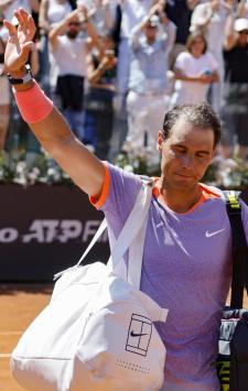 Rafael Nadal of Spain salutes the audience after losing his men's singles 2nd round match against Hubert Hurkacz of Poland (not pictured) at the Italian Open tennis tournament in Rome, Italy, 11 May 2024.  ANSA/FABIO FRUSTACI