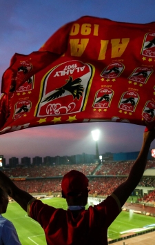 Team Captain of Al Ahly, Mohamed El Shenawy, is lifting the African Champions League trophy after the match between Al Ahly SC from Egypt and Esperance from Tunisia in the second match of the final African Champions League at the Cairo International Stadium, in Cairo, Egypt, on May 15, 2024, which is ending with the victory of the Al Ahly Club in the championship number 12 in its history. (Photo by Ayman Aref/NurPhoto) (Photo by Ayman Aref / NurPhoto / NurPhoto via AFP)