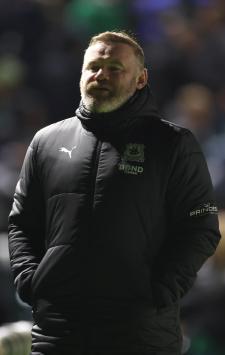 PLYMOUTH, ENGLAND - DECEMBER 10: Wayne Rooney manager of Plymouth Argyle looks dejected after the team's defeat during the Sky Bet Championship match between Plymouth Argyle FC and Swansea City AFC at Home Park on December 10, 2024 in Plymouth, England. (Photo by Michael Steele/Getty Images)