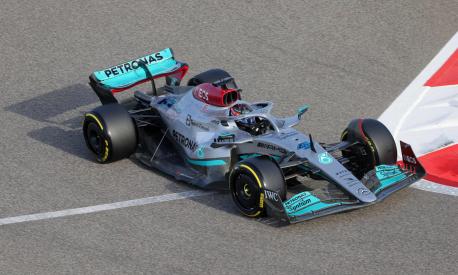 Mercedes' British driver George Russell drives during the third day of Formula One (F1) pre-season testing at the Bahrain International Circuit in the city of Sakhir on March 12, 2022. (Photo by Giuseppe CACACE / AFP)