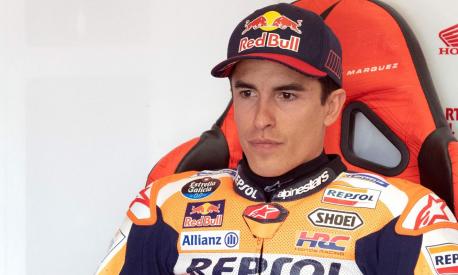 Honda Spanish rider Marc Marquez sits in his box during the fourth practice session of the MotoGP Spanish Grand Prix at the Jerez racetrack in Jerez de la Frontera on April 30, 2022. (Photo by JORGE GUERRERO / AFP)