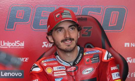 Ducati Lenovo Team Italian rider Francesco Bagnaia sits in his box during the third MotoGP free practice session ahead of the MotoGP German motorcycle Grand Prix at the Sachsenring racing circuit in Hohenstein-Ernstthal near Chemnitz, eastern Germany, on June 18, 2022. (Photo by Ronny Hartmann / AFP)