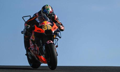 KTM South African rider Brad Binder rides during the warm-up before the MotoGP race of the Portuguese Grand Prix at the Algarve International Circuit in Portimao, on March 26, 2023. (Photo by PATRICIA DE MELO MOREIRA / AFP)