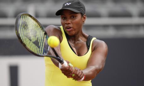 Taylor Townsend of the United States returns a ball to Jessica Pegula of the United States during their match at the Italian Open tennis tournament, in Rome, Thursday, May 11, 2023. (AP Photo/Alessandra Tarantino)