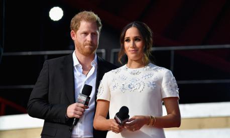 (FILES) Britain's Prince Harry and Meghan Markle speak during the 2021 Global Citizen Live festival at the Great Lawn, Central Park on September 25, 2021 in New York City. A multi-million-dollar deal between a media group run by Britain's Prince Harry and his wife Meghan Markle, and streaming giant Spotify is to end, a report said June 15, 2023. (Photo by Angela Weiss / AFP)