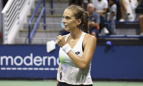 Lucia Bronzetti, of Italy, reacts during a match against Barbora Krejcikova, of the Czech Republic, during the first round of the U.S. Open tennis championships, Tuesday, Aug. 29, 2023, in New York. (AP Photo/Jason DeCrow)