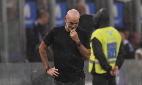 AC Milan's manager Stefano Pioli reacts during a Serie A soccer match between Inter Milan and AC Milan at the San Siro stadium in Milan, Italy, Saturday, Sept.16, 2023. (AP Photo/Antonio Calanni)