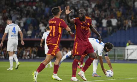 Roma's Romelu Lukaku, right, and Roma's Paulo Dybala celebrate after Renato Sanches scored their side's second goal during a Serie A soccer match between Roma and Empoli, at Rome's Olympic stadium, Sunday, Sept. 17, 2023. (AP Photo/Alessandra Tarantino)