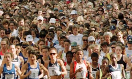 A field of over 6500 women, including eventual winner Catherine Ndereba of Kenya, front row far right, fills Beacon Street Sunday, Oct. 8, 2000, in Boston at the start of the 24th Annual Tufts 10-kilometer race for women. Ndereba, the winner of the 2000 Boston Marathon, won the Tufts race with a time of 32:46. (AP Photo/Christopher Pfuhl)
