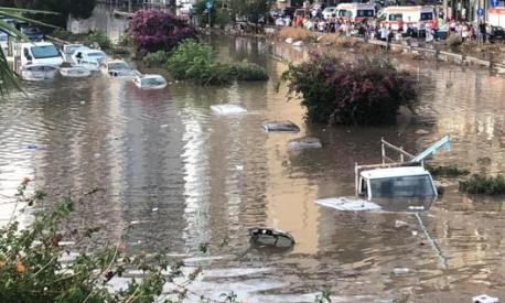 Gli effetti della pioggia violentissima che ha colpito Palermo lo scorso 15 luglio. Ansa