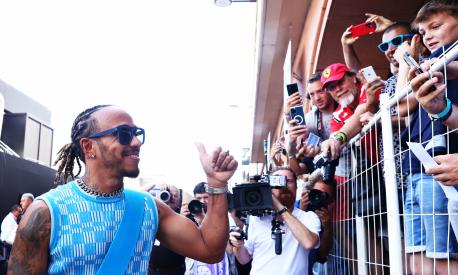 MONTE-CARLO, MONACO - MAY 28: Lewis Hamilton of Great Britain and Mercedes greets fans at the circuit prior to final practice ahead of the F1 Grand Prix of Monaco at Circuit de Monaco on May 28, 2022 in Monte-Carlo, Monaco. (Photo by Clive Rose/Getty Images)
