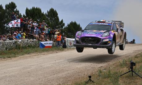 Craig Breen of Ireland steers his Ford assisted by his co-driver Paul Nagle, across Micky's Jump on June 4, 2022 during the SS15 special near Pattada of the Rally of Sardegna, 5th round of the FIA World Rally Championship. (Photo by Andreas SOLARO / AFP)