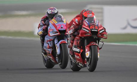 DOHA, QATAR - MARCH 05: Francesco Bagnaia of Italy and Ducati Lenovo Team leads Enea Bastianini of Italy and Gresini Racing MotoGP  during the MotoGP of Qatar - Qualifying at Losail Circuit on March 05, 2022 in Doha, Qatar. (Photo by Mirco Lazzari gp/Getty Images,)
