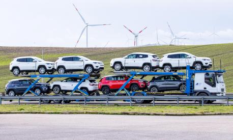 The cars produced in the Stellantis factory leave the Lucanian factory and are transported to the dealerships in San Nicola di Melfi (Potenza), 21 January 2021. About seven thousand people work in the Lucanian factory - where 500 X, Jeep Renegade and Compass are produced. ANSA / TONY VECE.