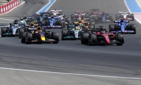 Ferrari driver Charles Leclerc of Monaco leads at the start and followed by Red Bull driver Max Verstappen of the Netherlands and Mercedes driver Lewis Hamilton of Britain during the French Formula One Grand Prix at Paul Ricard racetrack in Le Castellet, southern France, Sunday, July 24, 2022. (AP Photo/Manu Fernandez)