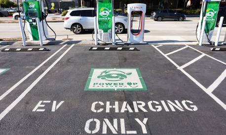 PASADENA, CALIFORNIA - APRIL 14: An 'EV Charging Only' sign is seen at a Power Up fast charger station for electric vehicles on April 14, 2022 in Pasadena, California. California has unveiled a proposal which would end the sale of gasoline-powered cars requiring all new cars to have zero emissions by 2035.   Mario Tama/Getty Images/AFP == FOR NEWSPAPERS, INTERNET, TELCOS & TELEVISION USE ONLY ==
