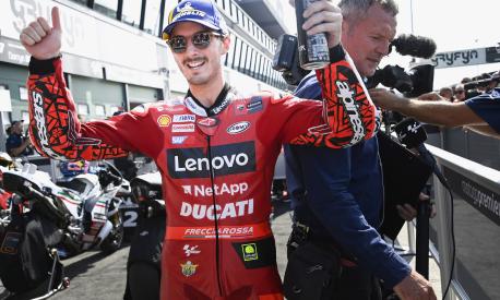 MISANO ADRIATICO, ITALY - SEPTEMBER 04: Francesco Bagnaia of Italy and Ducati Lenovo Team celebrates the victory under the podium at the end of the MotoGP race during the MotoGP Of San Marino - Race at Misano World Circuit on September 04, 2022 in Misano Adriatico, Italy. (Photo by Mirco Lazzari gp/Getty Images)