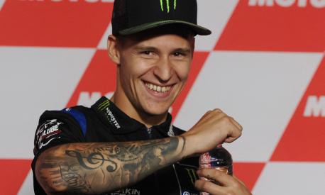 Monster Energy Yamaha MotoGP rider Fabio Quartararo of France smiles during a pre-event press conference at the MotoGP Japanese Grand Prix in the Twin Ring Motegi circuit in Motegi, Tochigi prefecture on September 22, 2022. (Photo by Toshifumi KITAMURA / AFP)