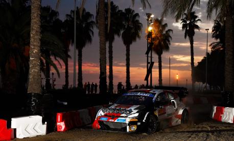 Toyota Gazoo Racing WRT's driver Sebastien Ogier of France steers his Toyota Gr Yaris assisted by Benjamin Veillas of France during the second day of the Catalonia 2022 FIA World Rally Championship in Salou, on October 22, 2022. (Photo by Pau BARRENA / AFP)