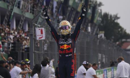 Red Bull driver Max Verstappen, of the Netherlands, celebrates winning the Formula One Mexico Grand Prix at the Hermanos Rodriguez racetrack in Mexico City, Sunday, Oct. 30, 2022. (AP Photo/Fernando Llano)