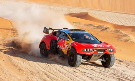 epa10401060 French driver Sebastien Loeb and Belgain co-driver Fabian Lurquin of Bahrain Raid Xtreme team in action during the 11th stage of the Dakar Rally 2023 from Shaybah to Empty Quarter, Saudi Arabia, 12 January 2023.  EPA/Gerard Laurenssen