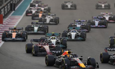 Red Bull driver Max Verstappen of the Netherlands leads at the start during the Formula One Abu Dhabi Grand Prix, in Abu Dhabi, United Arab Emirates Sunday, Nov. 20, 2022. (AP Photo/Hussein Malla)