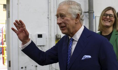 Britain's King Charles visits a food bank in Milton Keynes, Britain, Thursday Feb. 16, 2023. (Molly Darlington/Pool via AP)