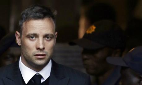 FILE - In this Wednesday, June 15, 2016, file photo, Oscar Pistorius leaves the High Court in Pretoria, South Africa, after his sentencing proceedings. South African former track star Oscar Pistorius has met with the father of Reeva Steenkamp, the woman he shot to death in 2013, as part of his parole process, the Steenkamp's family lawyer told The Associated Press on Friday July 1, 2022. (AP Photo/Themba Hadebe, File)