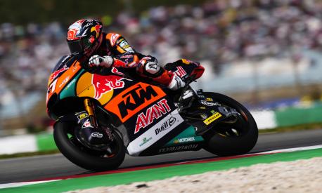 Moto2 rider Pedro Acosta of Spain steers his motorcycle during the Portugal Motorcycle Grand Prix, at the Algarve International circuit near Portimao, Portugal, Sunday, March 26, 2023. (AP Photo/Jose Breton)