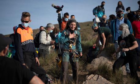 TOPSHOT - Spanish sportswoman Beatriz Flamini reacts upon getting out of a cave in Los Gauchos, near Motril on April 14, 2023 after spending 500 days inside. (Photo by JORGE GUERRERO / AFP)