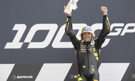 LE MANS, FRANCE - MAY 14: Marco Bezzecchi of Italy and Mooney VR46 Racing Team celebrates the victory on the podium at the end of the MotoGP race during the MotoGP of France - Race on May 14, 2023 in Le Mans, France. (Photo by Mirco Lazzari gp/Getty Images)