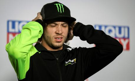 Mooney VR46 Racing Team's Italian rider Marco Bezzecchi reacts during a press conference ahead of the MotoGP German motorcycle Grand Prix at the Sachsenring racing circuit in Hohenstein-Ernstthal near Chemnitz, eastern Germany, on June 15, 2023. (Photo by Ronny Hartmann / AFP)