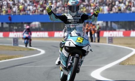 Spain's rider Jaume Masia celebrates after winning the Moto3 race at the Dutch Grand Prix in Assen, northern Netherlands, Sunday, June 25, 2023. (AP Photo/Peter Dejong)
