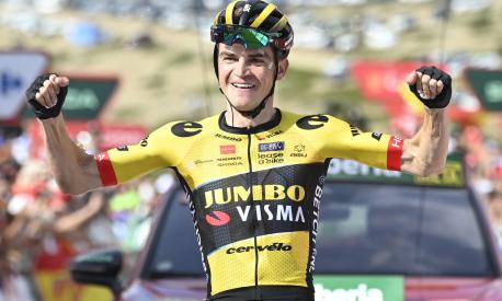 Team Jumbo-Visma's US rider Sepp Kuss celebrates winning the sixth stage of the 2023 La Vuelta cycling tour of Spain, a 183,1 km race from La Vall d'Uixo to Alto de Javalambre, on August 31, 2023. (Photo by JOSE JORDAN / AFP)