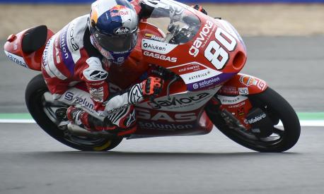Colombian rider David Alonso of the Gaviota GASGAS Aspar M3 steers his motorcycle during the Moto 3 race of the British Motorcycle Grand Prix at the Silverstone racetrack, in Silverstone, England, Sunday, Aug. 6, 2023. (AP Photo/Rui Vieira)