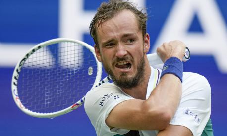 Daniil Medvedev, of Russia, returns a shot to Andrey Rublev, of Russia, during the quarterfinals of the U.S. Open tennis championships, Wednesday, Sept. 6, 2023, in New York. (AP Photo/Seth Wenig)