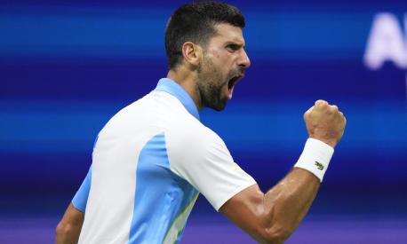 Novak Djokovic, of Serbia, reacts during a match against Ben Shelton, of the United States, during the men's singles semifinals of the U.S. Open tennis championships, Friday, Sept. 8, 2023, in New York. (AP Photo/Frank Franklin II)