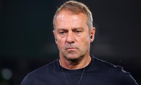 WOLFSBURG, GERMANY - SEPTEMBER 09: Hansi Flick, Head Coach of Germany is interviewed after the team's defeat in the international friendly match between Germany and Japan at Volkswagen Arena on September 09, 2023 in Wolfsburg, Germany. (Photo by Alex Grimm/Getty Images)