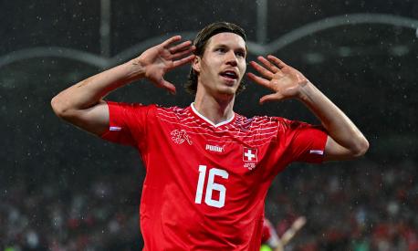 Switzerland's forward #16 Cedric Itten celebrates after he scored the first goal for his team during the UEFA Euro 2024 football tournament Group I qualifying match between Switzerland and Andorra at Tourbillon stadium in Sion on September 12,  2023. (Photo by Fabrice COFFRINI / AFP)